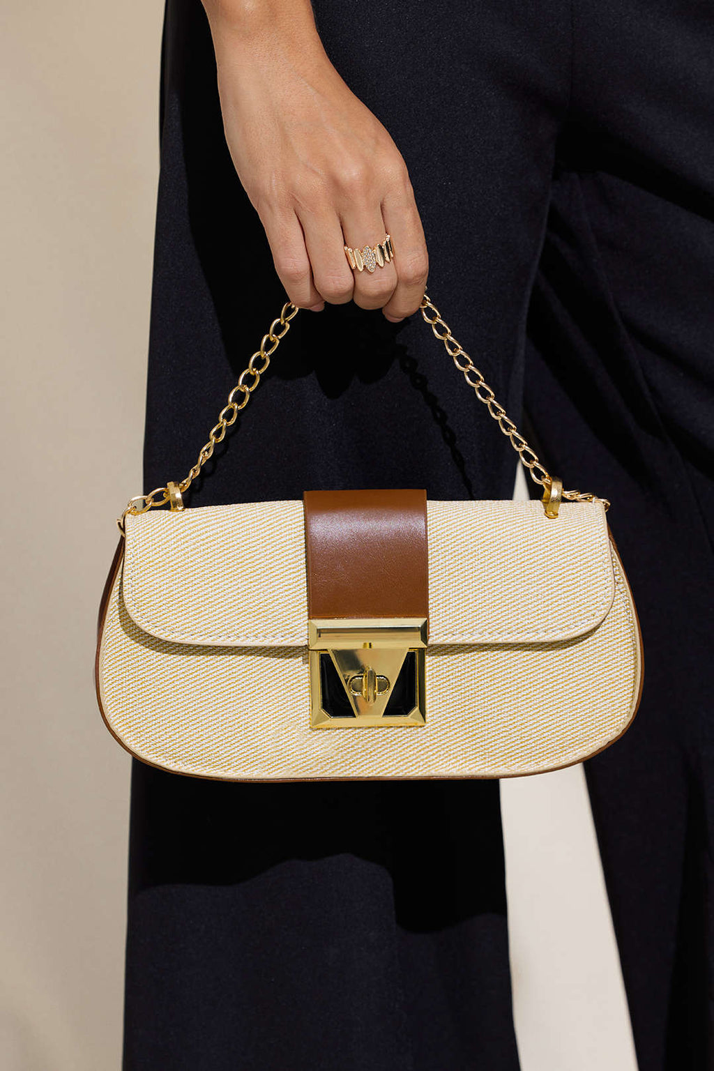 Voralis beige clutch bag - chain strap detail
