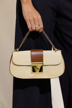 Voralis beige clutch bag - chain strap detail