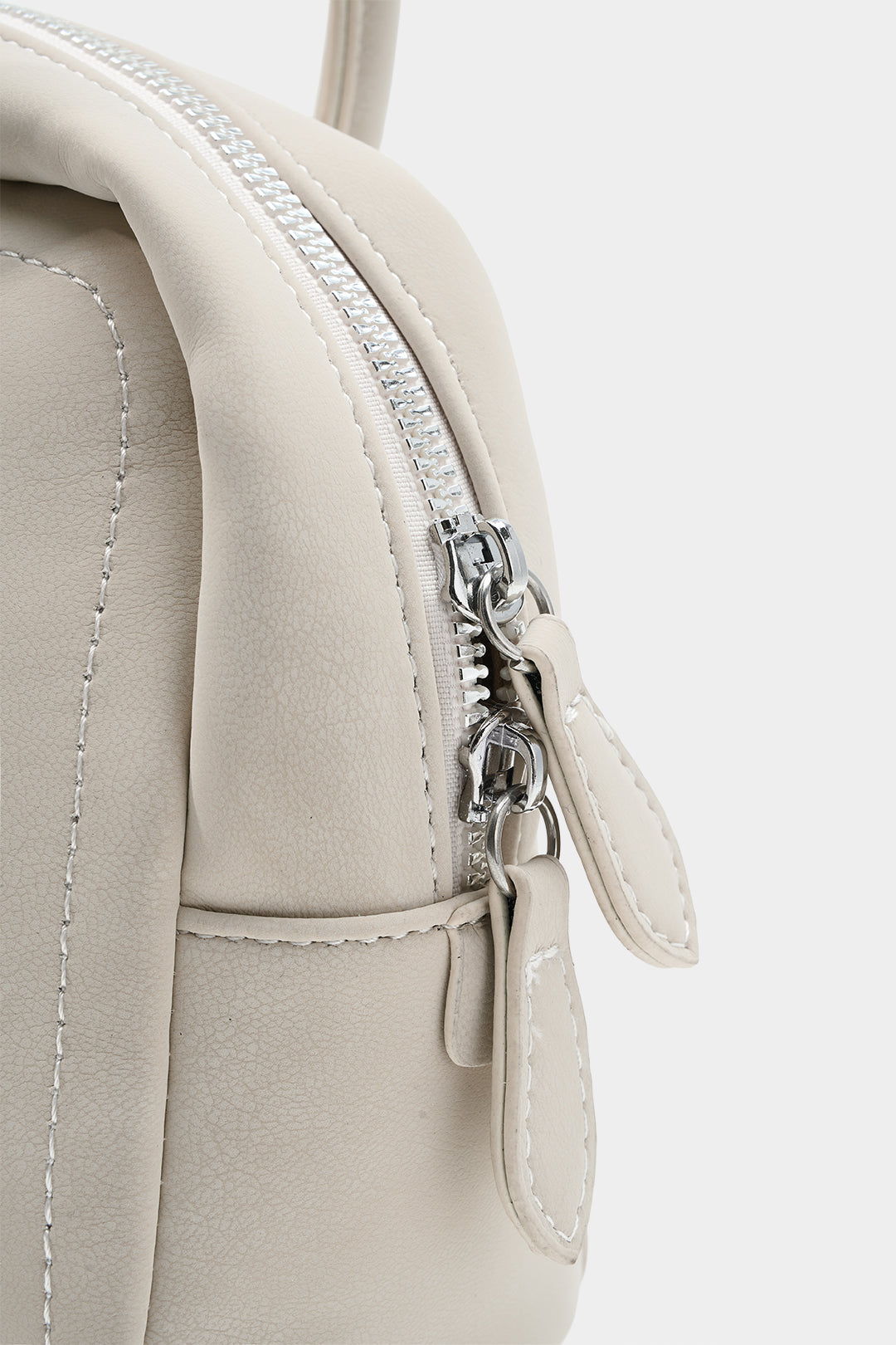 Voralis faux leather shoulder bag - side profile view