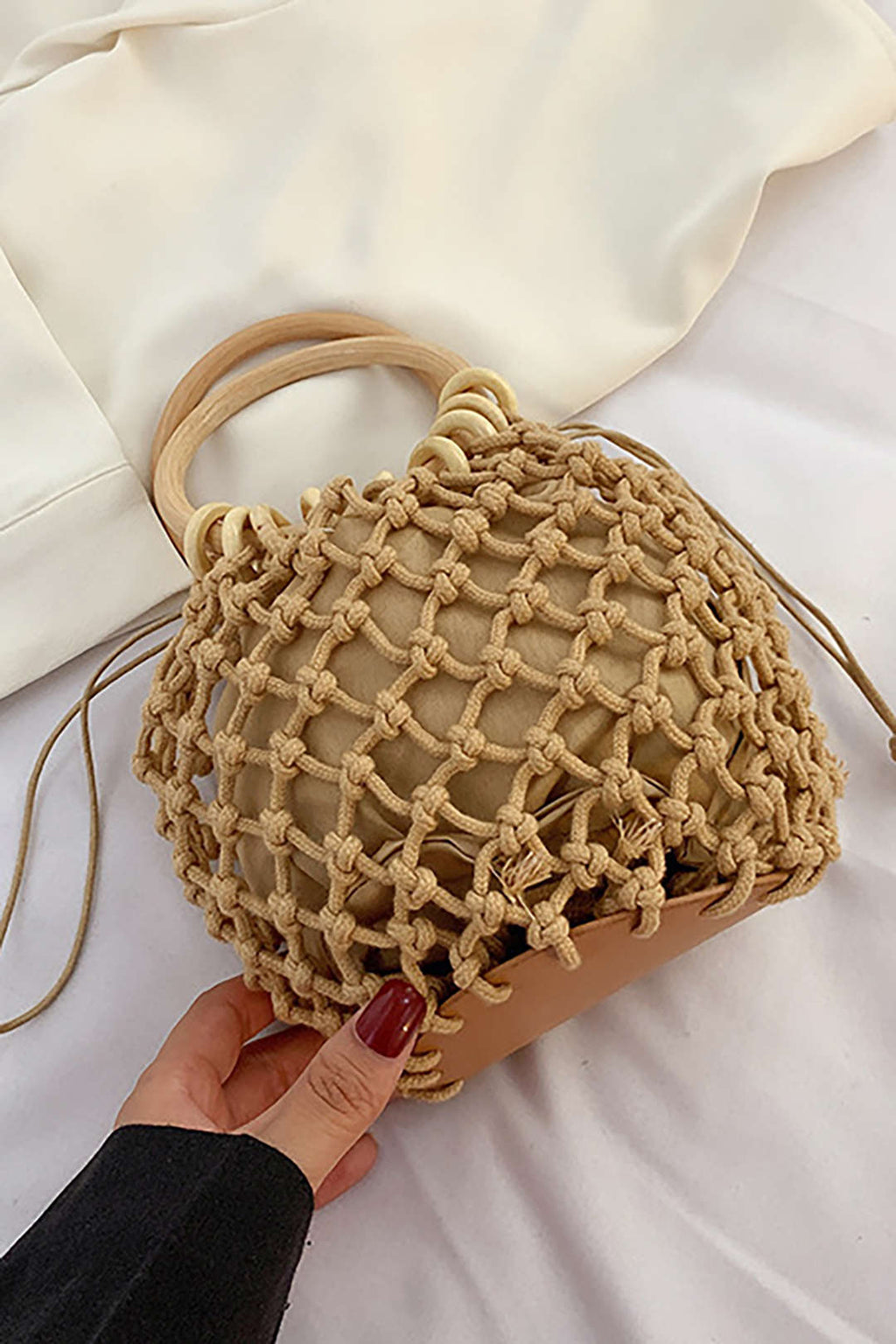 Voralis khaki straw tote bag - wooden handle close-up
