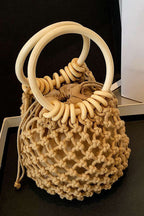 Voralis straw tote bag being carried - lifestyle shot